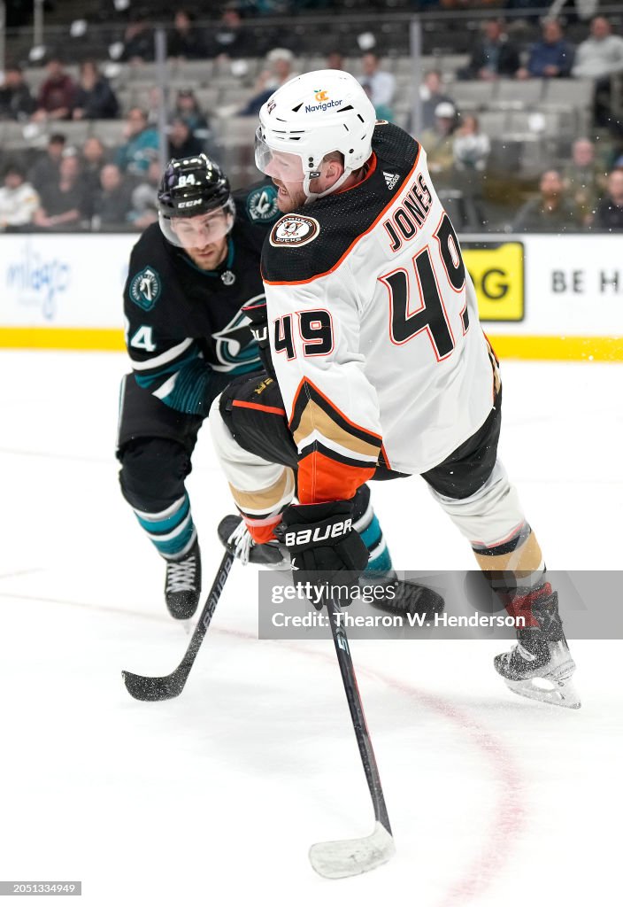 Jan Rutta Jan Rutta of the San Jose Sharks collides with Max Jones of the... News ...