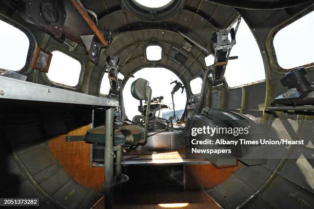 View where a bombardier would sit and straddle a norden bombsight and drop bombs from is seen in a B-17G plane at the Empire State Aerosciences...