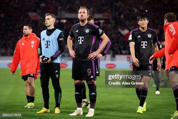 Harry Kane of Bayern Munich looks dejected as players of Bayern Munich acknowledge the fans after drawing with SC Freiburg during the Bundesliga...