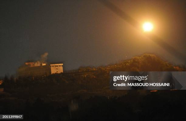 Helicopter shoots at the Intercontinental hotel in response to an attack on the hotel by Taliban fighters in Kabul on June 29, 2011. Taliban suicide...