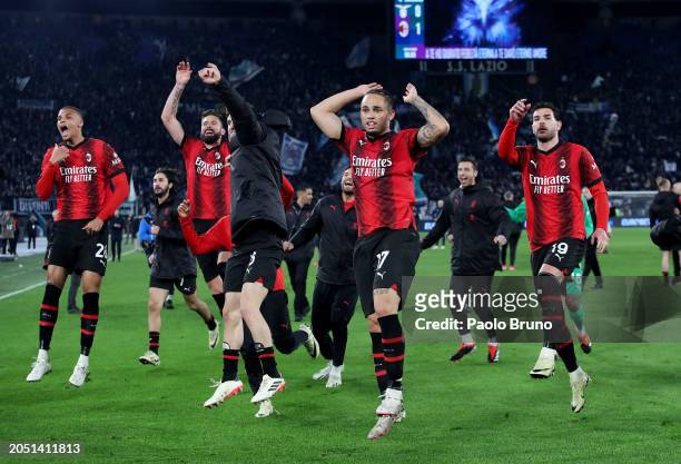 Noah Okafor of AC Milan celebrates with teammates after defeating SS Lazio as they acknowledge the fans after the Serie A TIM match between SS Lazio...