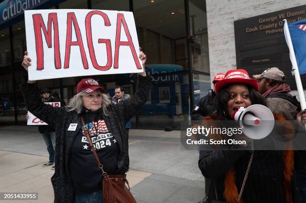 Small group of demonstrators rally to advocate for keeping Republican presidential candidate former President Donald Trump on the primary ballot in...
