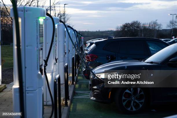 Full electric vehicle charging station at Rugby Services on the M6 near Birmingham on the 16th of January 2024 in United Kingdom. As electric vehicle...