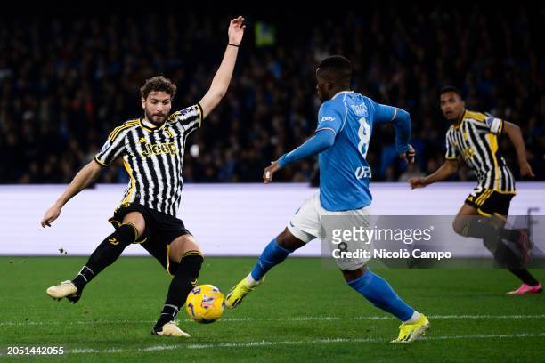 Manuel Locatelli of Juventus FC competes for the ball with Hamed Junior Traore of SSC Napoli during the Serie A football match between SSC Napoli and...