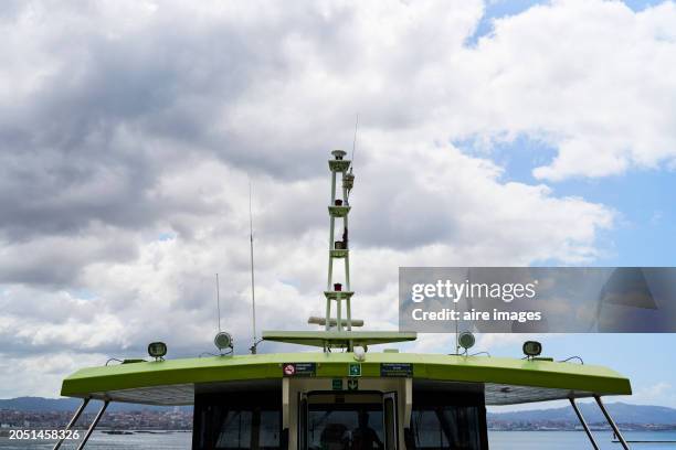 front view of the structure of an observation deck with several empty seats on a yacht with the sky in the background - vigo stock pictures, royalty-free photos & images