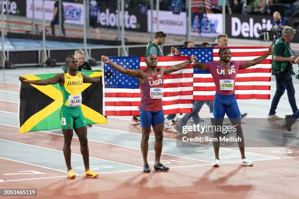 Ackeem Blake of Jamaica, Christian Coleman of the United States and Noah Lyles of the United States pose for photos following the men's 60 metres...