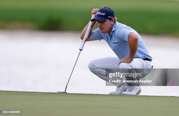 Bud Cauley of the United States lines up a putt on the 16th green during the second round of The Cognizant Classic in The Palm Beaches at PGA...