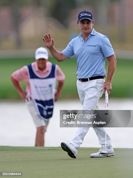 Bud Cauley of the United States reacts to his putt on the 16th green during the second round of The Cognizant Classic in The Palm Beaches at PGA...