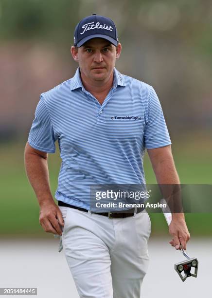 Bud Cauley of the United States reacts to his putt on the 16th green during the second round of The Cognizant Classic in The Palm Beaches at PGA...