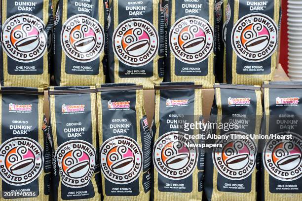 Bags of Dunkin' Dunuts dark roast coffee is seen at a press conference where Eric Stensland, Field Marketing Manager, Dunkin' Donuts donated 100...