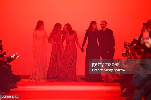 Maryna Linchuk, Natalia Vodianova, Marcia Cross, Carmen Kass and Guram Gvasalia pose on the runway during the Vetements Womenswear Fall/Winter...