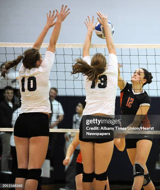 Bethlehem's Jenna Giacone, right, tries to get the ball by Shenendehowa's Lauren Canterbury, #10 and Taylor Murphy during the Class AA Section II...