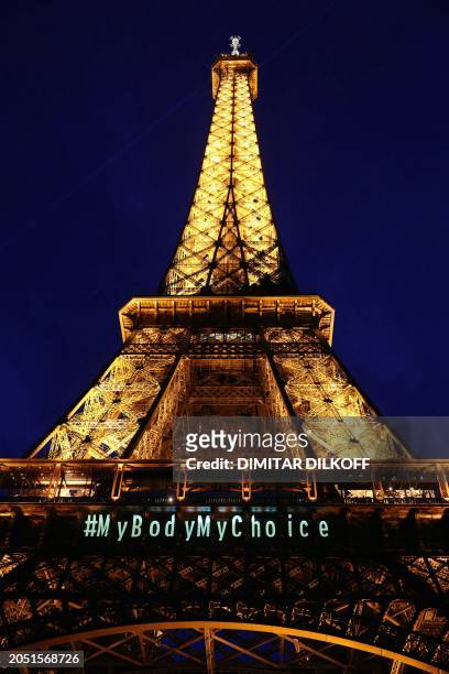 Message reading "My body my choice" is projected onto the Eiffel Tower after the French parliament voted to anchor the right to abortion in the...
