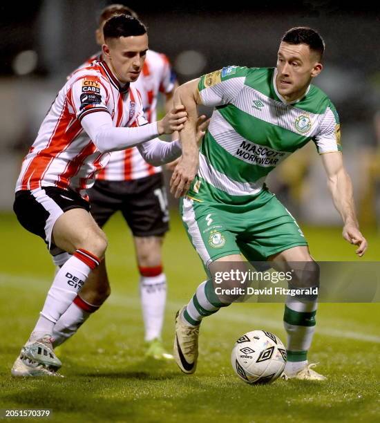 Dublin , Ireland - 4 March 2024; Aaron Greene of Shamrock Rovers in action against Jordan McEneff of Derry City during the SSE Airtricity Men's...