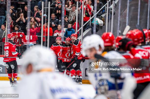 Jason Fuchs of Lausanne HC celebrates his goal with teammates during the National League match between Lausanne HC and EV Zug at Vaudoise Arena on...