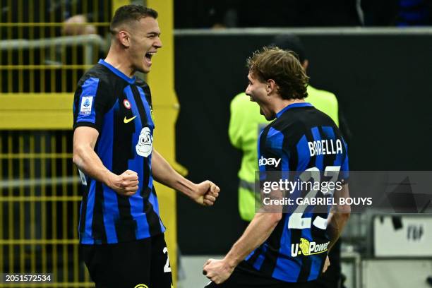 Inter Milan's Albanian midfielder Kristjan Asllani celebrates scoring his team's first goal during the Italian Serie A football match between Inter...