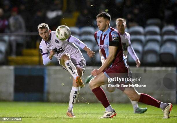 Louth , Ireland - 4 March 2024; Sten Reinkort of Bohemians has a shot on goal despite the attention of Hayden Cann of Drogheda United during the SSE...