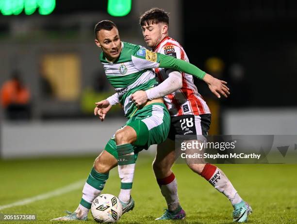 Dublin , Ireland - 4 March 2024; Graham Burke of Shamrock Rovers in action against Adam O'Reilly of Derry City during the SSE Airtricity Men's...