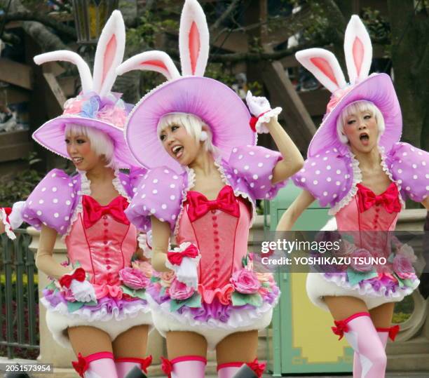 Dancers in bunny costumes during the press preview for the new parade "Disney Easter Wonderland" at the Tokyo Disneyland at Urayasu city, suburban...