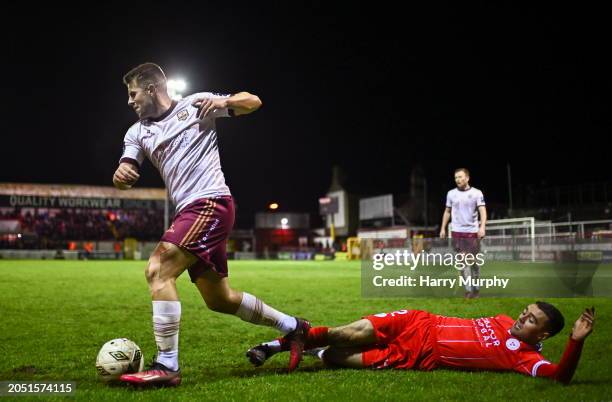 Dublin , Ireland - 4 March 2024; Regan Donelon of Galway United is tackled by Dean Williams of Shelbourne during the SSE Airtricity Men's Premier...