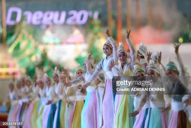 Performers dance during the opening ceremony for the International Association of Athletics Federations World Championships in Daegu on August 27,...