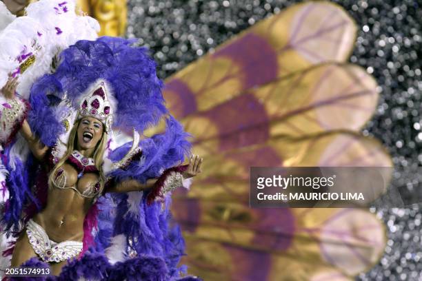 Reveller performs on a float of 'Gavioes da Fiel' samba school, at Anhembi Sambadrome during the opening night of carnival celebrations, in Sao...