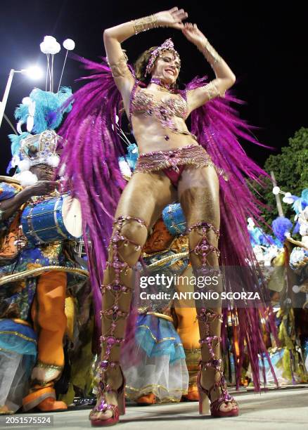 Luma de Oliveira, Queen of the Drums of Caprichosos de Pilares samba school performs ahead of the band 07 February on the second evening of the...