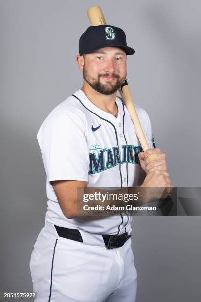 Cal Raleigh of the Seattle Mariners poses for a photo during the Seattle Mariners Photo Day at Peoria Sports Complex on Friday, February 23, 2024 in...
