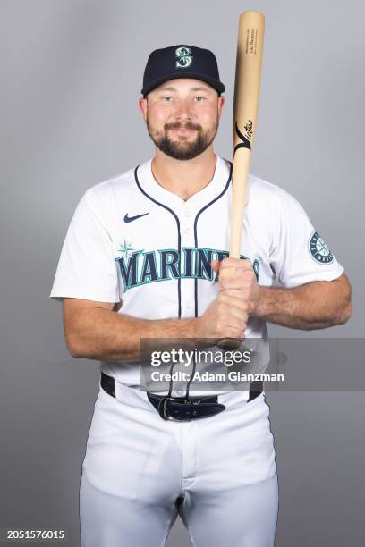 Cal Raleigh of the Seattle Mariners poses for a photo during the Seattle Mariners Photo Day at Peoria Sports Complex on Friday, February 23, 2024 in...