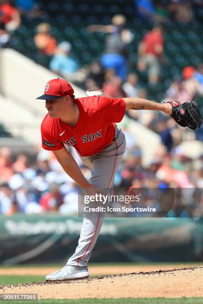 Boston Red Sox pitcher Josh Winckowski delivers a pitch to the plate during the spring training game between the Boston Red Sox and the Detroit...