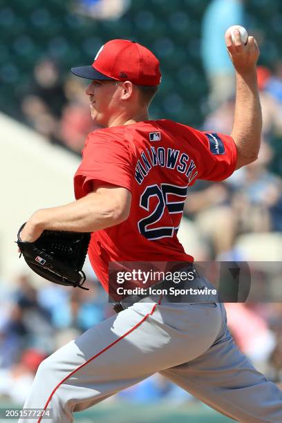 Boston Red Sox pitcher Josh Winckowski delivers a pitch to the plate during the spring training game between the Boston Red Sox and the Detroit...