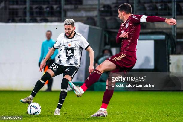Farid EL-MELALI of Angers and Thomas MANGANI of Ajaccio during the Ligue 2 BKT match between Angers and Ajaccio at Stade Raymond Kopa on March 4,...