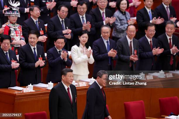 Chinese President Xi Jinping and Chinese Premier Li Qiang attend the opening of the second session of the 14th National People's Congress at The...