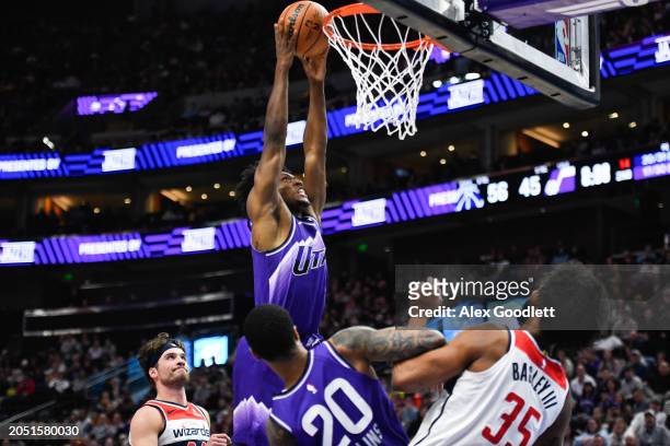 Collin Sexton of the Utah Jazz dunks the ball during the first half of a game against the Washington Wizards at Delta Center on March 04, 2024 in...