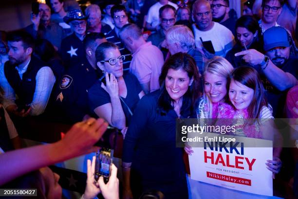 Republican presidential candidate, former U.N. Ambassador Nikki Haley poses for pictures with her supporters following a campaign rally on March 4,...