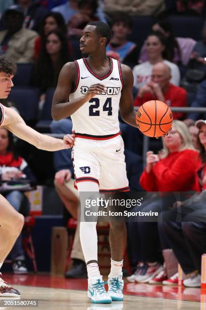 Dayton Flyers guard Kobe Elvis looks to pass the ball during the game against the Davidson Wildcats and the Dayton Flyers on February 27 at UD Arena...