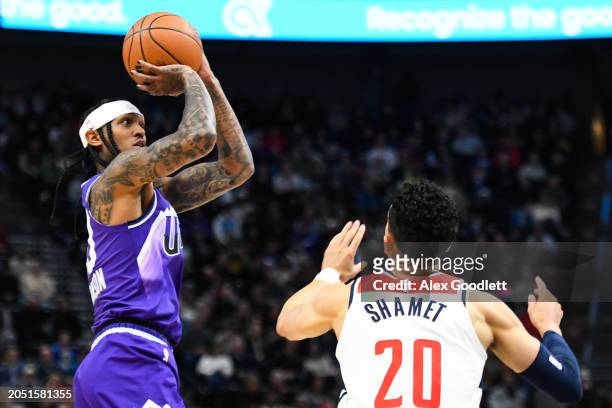 Jordan Clarkson of the Utah Jazz shoots the ball against Landry Shamet of the Washington Wizards during the first half of a game at Delta Center on...