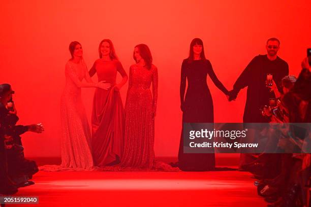 Maryna Linchuk, Natalia Vodianova, Marcia Cross, Carmen Kass and Guram Gvasalia pose on the runway during the Vetements Womenswear Fall/Winter...
