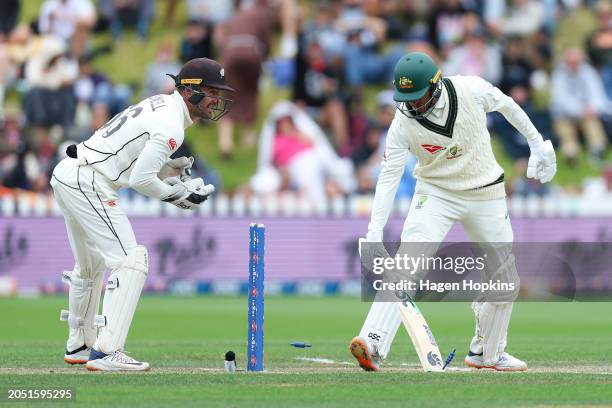 Usman Khawaja of Australia is stumped by Tom Blundell of New Zealand during day three of the First Test in the series between New Zealand and...