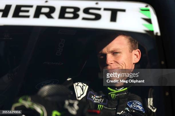 Riley Herbst, driver of the Monster Energy Ford, sits in his car during practice for the NASCAR Xfinity Series The LiUNA! at Las Vegas Motor Speedway...