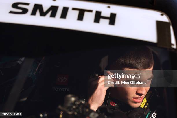 Chandler Smith, driver of the QuickTie Toyota, sits in his car during practice for the NASCAR Xfinity Series The LiUNA! at Las Vegas Motor Speedway...