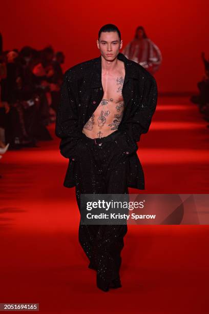 Model walks the runway during the Vetements Womenswear Fall/Winter 2024-2025 show as part of Paris Fashion Week on March 01, 2024 in Paris, France.