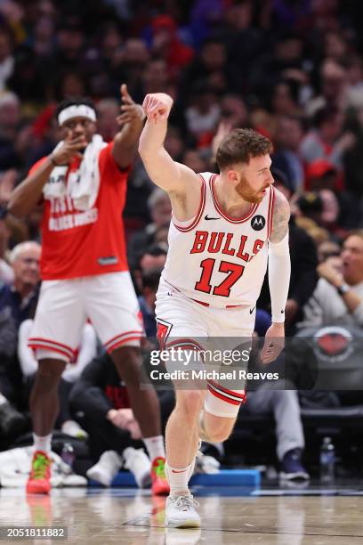 Onuralp Bitim of the Chicago Bulls celebrates a three pointer against the Cleveland Cavaliers during the first half at the United Center on February...