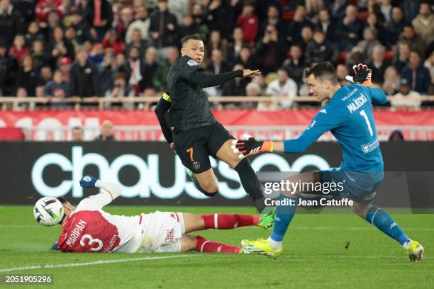 Kylian Mbappe of PSG, Monaco goalkeeper Radoslaw Majecki in action during the Ligue 1 Uber Eats match between AS Monaco and Paris Saint-Germain at...