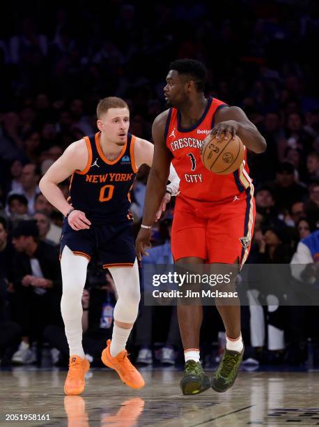 Zion Williamson of the New Orleans Pelicans in action against Donte DiVincenzo of the New York Knicks at Madison Square Garden on February 27, 2024...