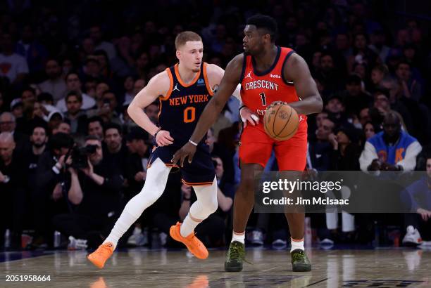 Zion Williamson of the New Orleans Pelicans in action against Donte DiVincenzo of the New York Knicks at Madison Square Garden on February 27, 2024...