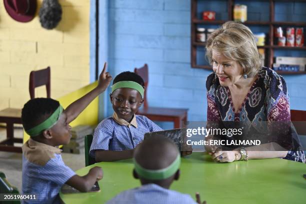 Queen Mathilde of Belgium meets children as she visits the Mamie Faitai preschool in Yopougon, Yop City, a suburb of Abidjan, Ivory Coast on Tuesday...