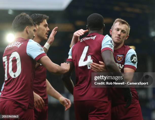 West Ham United's Kurt Zouma celebrates scoring his side's first goal with James Ward-Prowse during the Premier League match between Everton FC and...