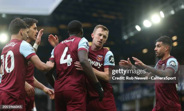 West Ham United's Kurt Zouma celebrates scoring his side's first goal with James Ward-Prowse during the Premier League match between Everton FC and...