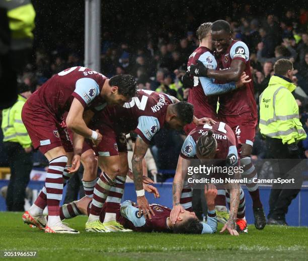 West Ham United celebrate their third goal scored by Edson Alvarez during the Premier League match between Everton FC and West Ham United at Goodison...